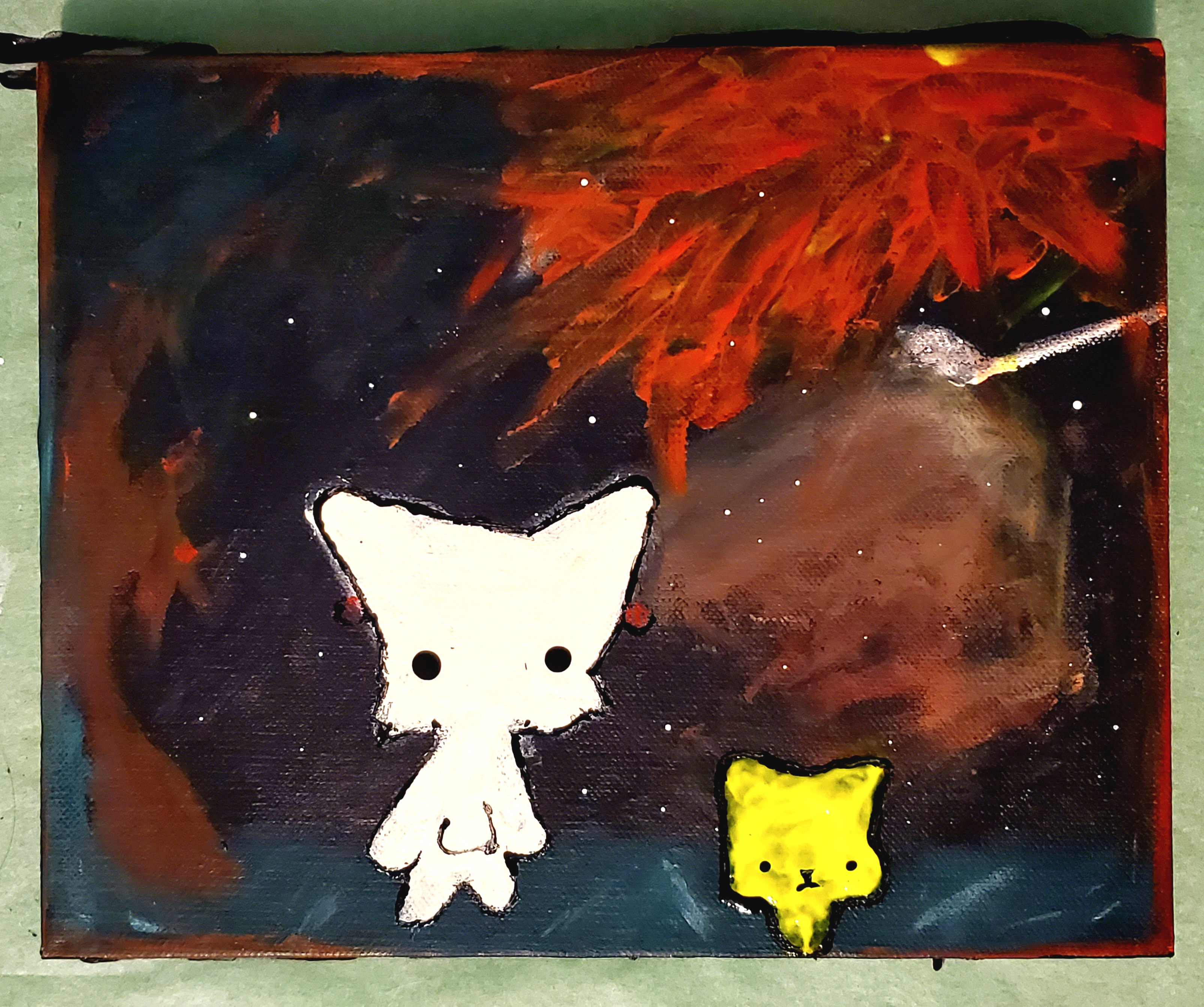 fingerpainting with two cats